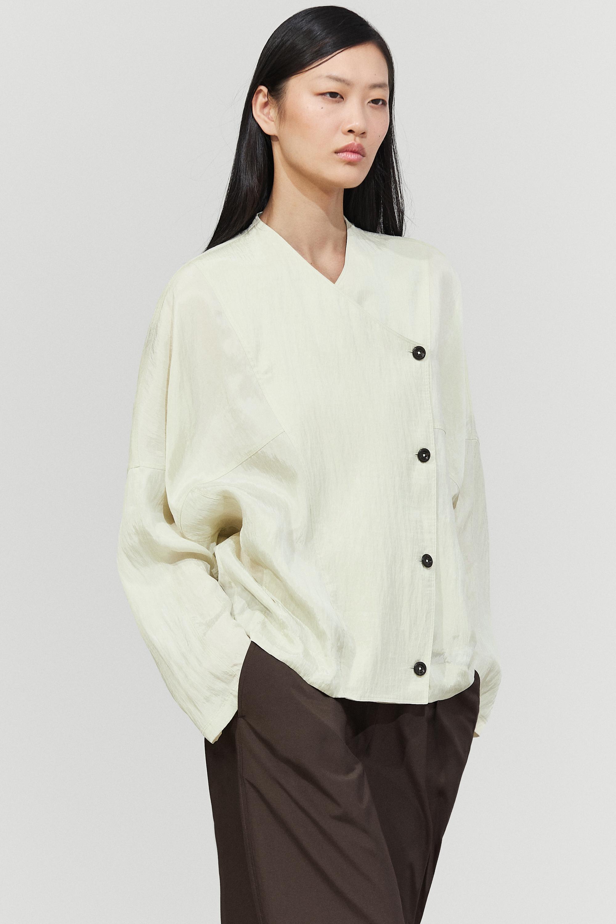 Fluid wrap shirt with button detail